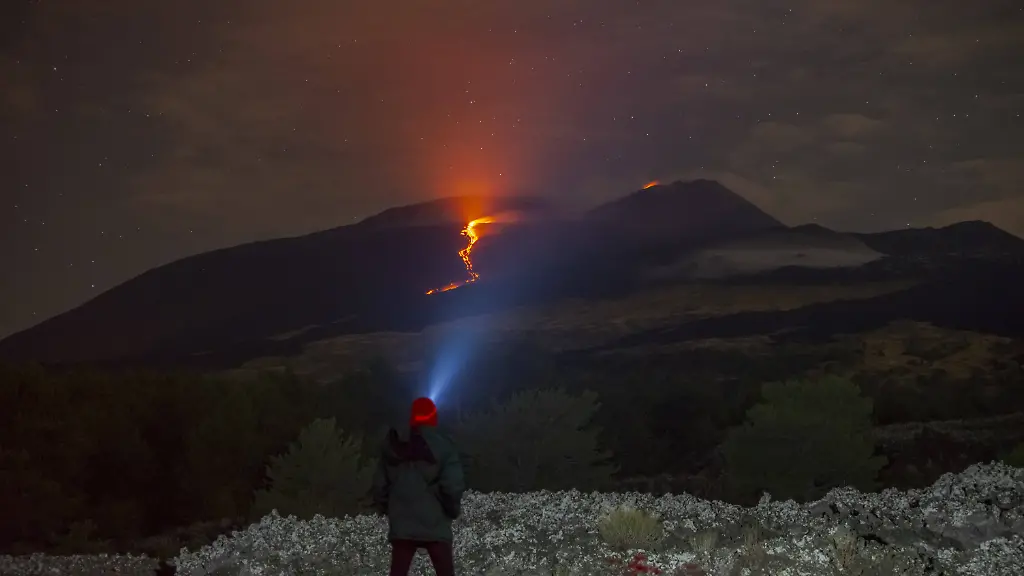 Lava-Flows-During-Mount-Etna-Eruption-CATANIA-ITALY-AUGUST-16-Lava-flows-down-the-slope-of-Mount-Etna-during-the-eruption-in-Catania-Italy-on-August-16-2025-The-lava-is-fed-by-an-effusive-fracture-that-opened-at-3-000-metres-on-August-10-located-between-the-Bocca-Nuova-and-South-East-craters-and-resumed-activity-on-August-14-The-most-advanced-lava-front-has-reached-an-altitude-of-about-2-700-metres-while-explosive-activity-continues-with-varying-intensity-from-the-Southeast-Crater-sending-ash-into-the-summit-area-as-the-aviation-alert-remains-at-orange-level-Salvatore-Allegra-Anadolu-Catania-Italy-Editorial-use-only-Please-get-in-touch-for-any-other-usage