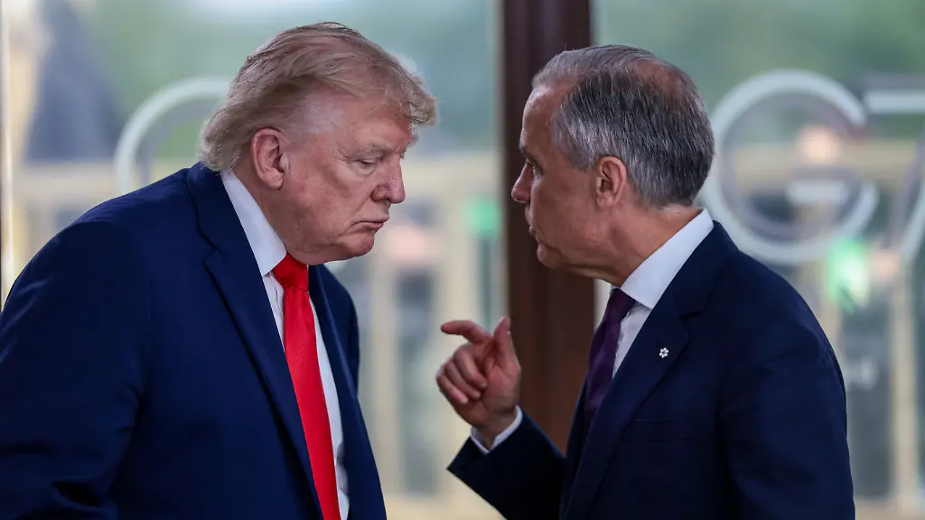 U-S-President-Donald-Trump-speaks-with-Canadian-Prime-Minister-Mark-Carney-at-a-working-lunch-with-leaders-of-G7-and-the-Middle-East-in-Evian-les-Bains-France-June-16-2026