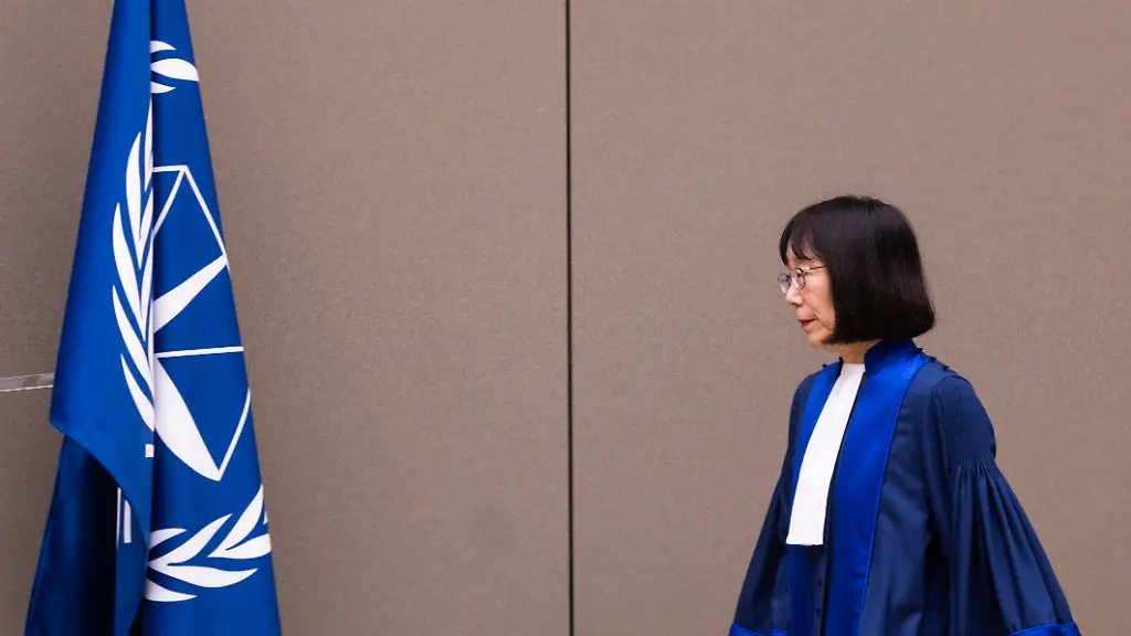 Judge-Tomoko-Akane-walks-before-delivering-the-verdict-in-the-Al-Hassan-case-at-the-International-Criminal-Court-in-The-Hague-Netherlands-Wednesday-Nov-20-2024