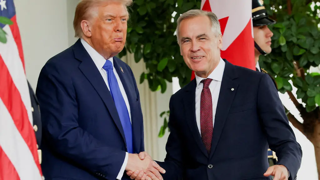 FILE-PHOTO-U-S-President-Donald-Trump-welcomes-Canada-s-Prime-Minister-Mark-Carney-at-the-White-House-in-Washington-D-C-U-S-October-7-2025