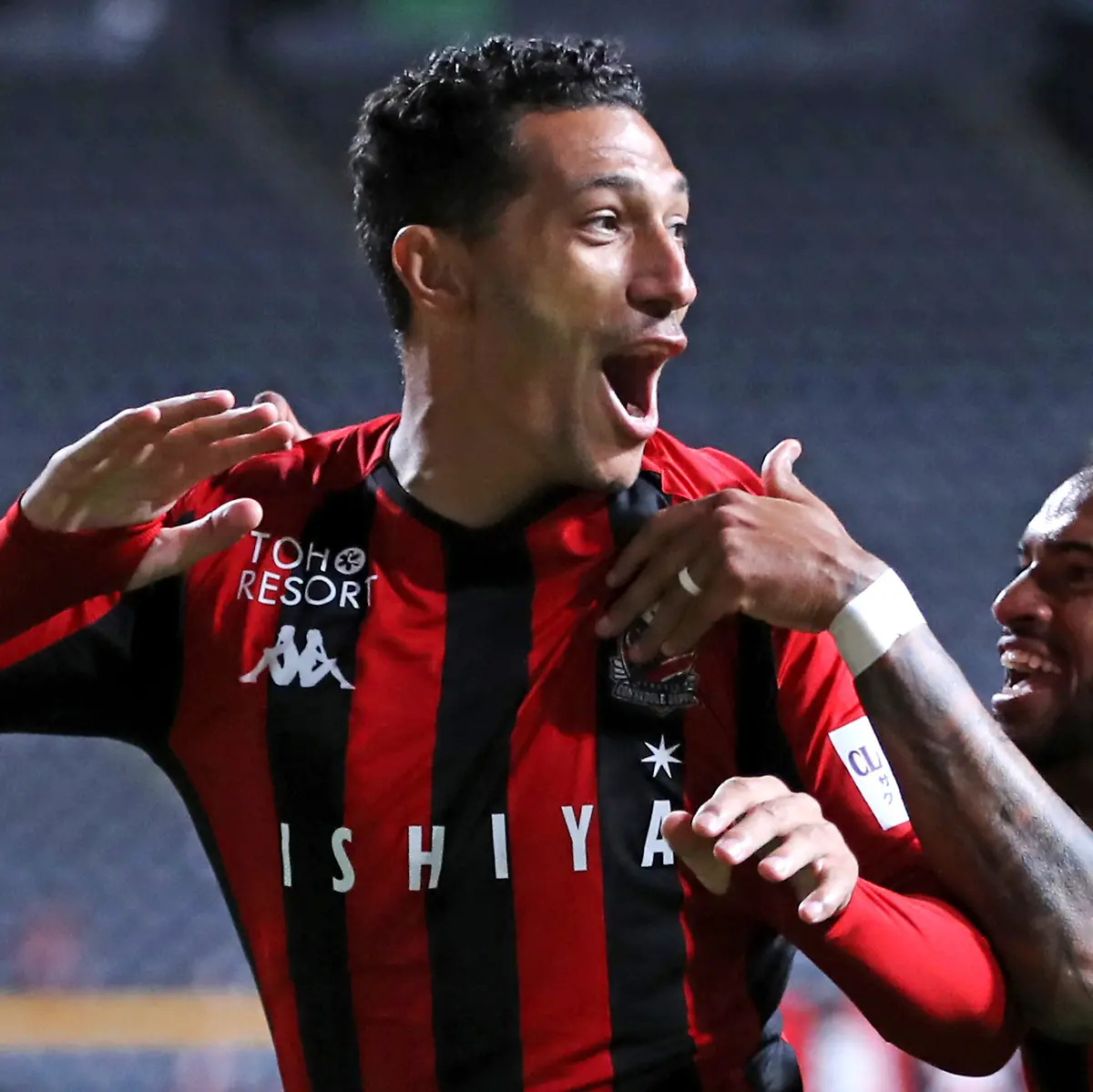 Jay-Bothroyd-English-forward-of-Hokkaido-Consadole-Sapporo-celebrates-after-scoring-with-Anderson-Lopes-R-in-the-second-half-of-the-J1-League-match-against-Sagan-Tosu-at-Sapporo-Dome-in-Sapporo-City-Hokkaido-Prefecture-on-November-14-2020-Hokkaido-Consadole-Sapporo-and-Sagan-Tosu-drew-by-1-1