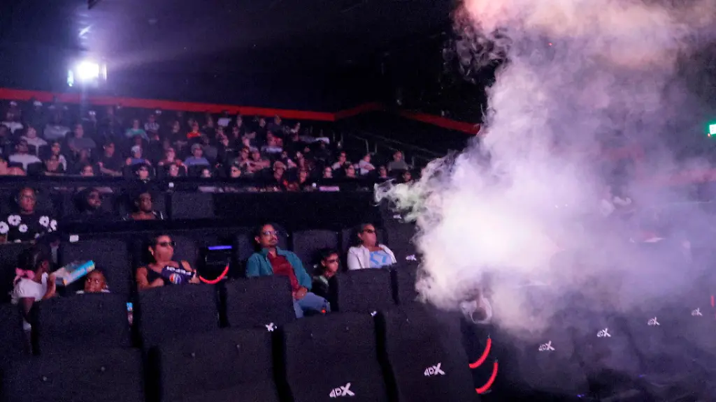 A-smoke-machine-releases-a-burst-of-fog-over-moviegoers-seated-in-a-4DX-auditorium-at-Regal-Sawgrass-in-Sunrise-Florida-on-August-8-2026-The-special-effects-experience-which-includes-motion-seats-water-wind-and-atmospheric-fog-was-part-of-a-screening-of-Spider-Man-Brand-New-Day-at-the-Broward-County-theater