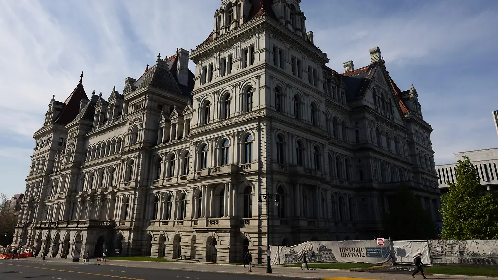 People-walk-by-the-New-York-State-Capitol-in-Albany-New-York-on-May-4-2026-New-York-State-Senator-Zellnor-Myrie-of-Brooklyn-chair-of-the-Senate-Codes-Committee-conducts-a-public-hearing-where-four-women-testify-about-their-accusations-of-sexual-abuse-against-Jeffrey-Epstein-They-urge-New-York-State-to-take-action-Senator-Myrie-is-advancing-legislation-to-hold-the-Epstein-Estate-and-Epstein-s-co-conspirators-more-accountable-for-sex-trafficking-crimes-in-New-York