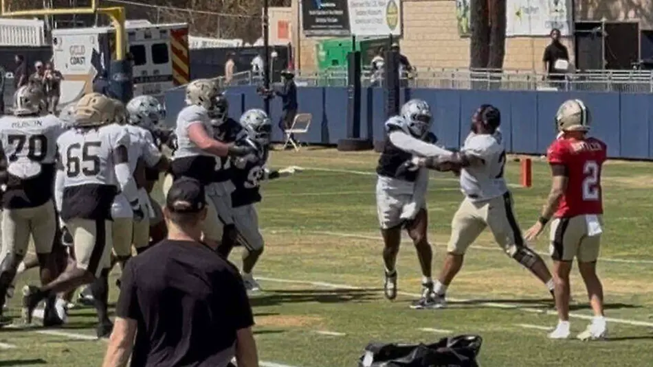 SPORTS-FBN-COWBOYS-FINE-FILEPIC-FT-Dallas-Cowboys-outside-linebacker-Donovan-Ezeiruaku-and-New-Orleans-Saints-offensive-tackle-Erik-McCoy-fight-at-a-training-camp-joint-practice-at-the-River-Ridge-Playing-Fields-in-Oxnard-Calif-on-Aug-18-2026