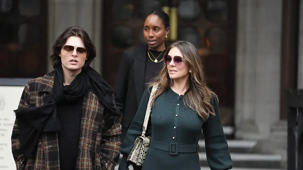 Associated-Newspapers-privacy-case-Elizabeth-Hurley-right-leaves-the-Royal-Courts-of-Justice-in-central-London-on-day-four-of-the-trial-over-allegations-of-unlawful-information-gathering-brought-against-Associated-Newspapers-Limited-ANL-by-seven-people-the-Duke-of-Sussex-Baroness-Doreen-Lawrence-Sir-Elton-John-David-Furnish-Liz-Hurley-Sadie-Frost-and-Sir-Simon-Hughes-Picture-date-Thursday-January-22-2026