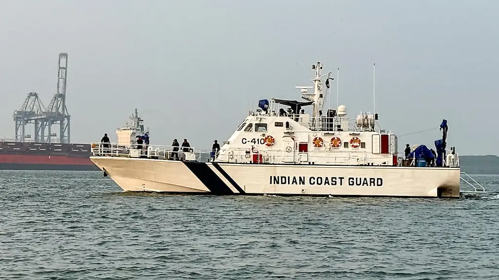 Indian-Coast-Guard-ships-are-stationed-near-the-historic-harbor-Fort-Kochi-Kerala-India-on-Dec-30-2025-The-Coast-Guard-plays-a-vital-role-in-maritime-security-search-and-rescue-operations-and-the-protection-of-Indias-coastal-waters