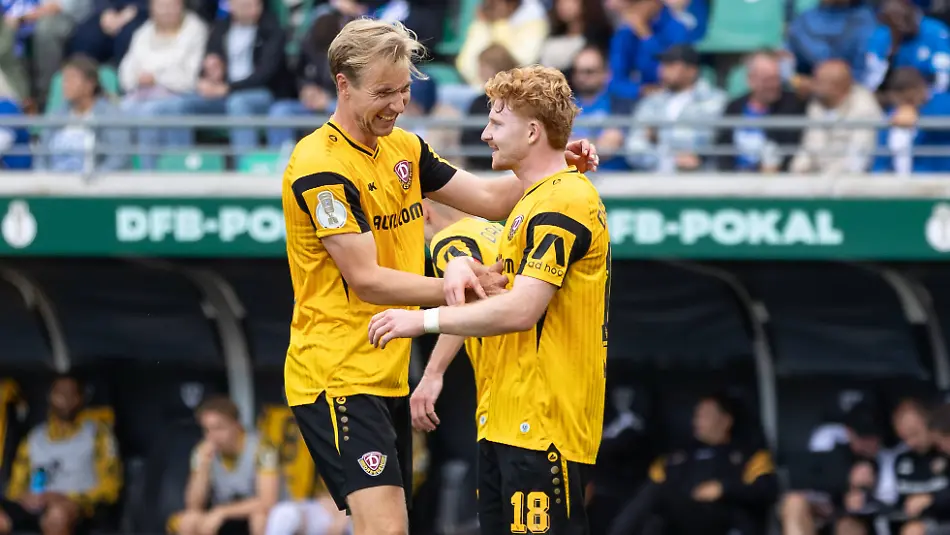 Muenster-Deutschland-23-August-2026-DFB-Pokal-2026-2027-1-Runde-SV-Westfalia-Rhynern-gegen-SG-Dynamo-Dresden-Im-Bild-v-re-Torschuetze-Robert-Wagner-SGD-jubelt-nach-seinem-Tor-zum-0-6-mit-Vincent-Vermeij-SGD-DFL-DFB-regulations-prohibit-any-use-of-photographs-as-image-sequences-and-or-quasi-video-LVM-Preussenstadion-Nordrhein-Westfalen-Muenster-Germany-August-23-2026-20262027-DFB-Cup-First-Round-SV-Westfalia-Rhynern-vs-SG-Dynamo-Dresden-Pictured-from-right-goal-scorer-Robert-Wagner-SGD-celebrates-his-goal-to-make-it-06-with-Vincent-Vermeij-SGD-DFL-and-DFB-regulations-prohibit-any-use-of-photographs-as-image-sequences-and-or-quasi-video