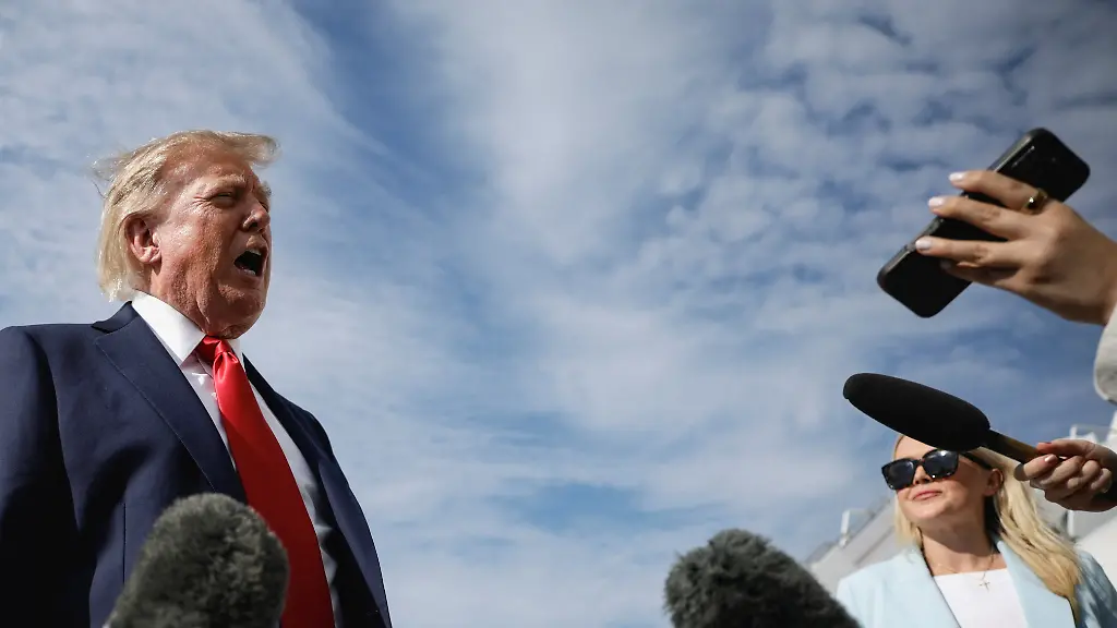 U-S-President-Donald-Trump-speaks-to-the-media-before-boarding-Air-Force-One-at-Joint-Base-Andrews-in-Maryland-U-S-en-route-to-Myrtle-Beach-South-Carolina-August-21-2026