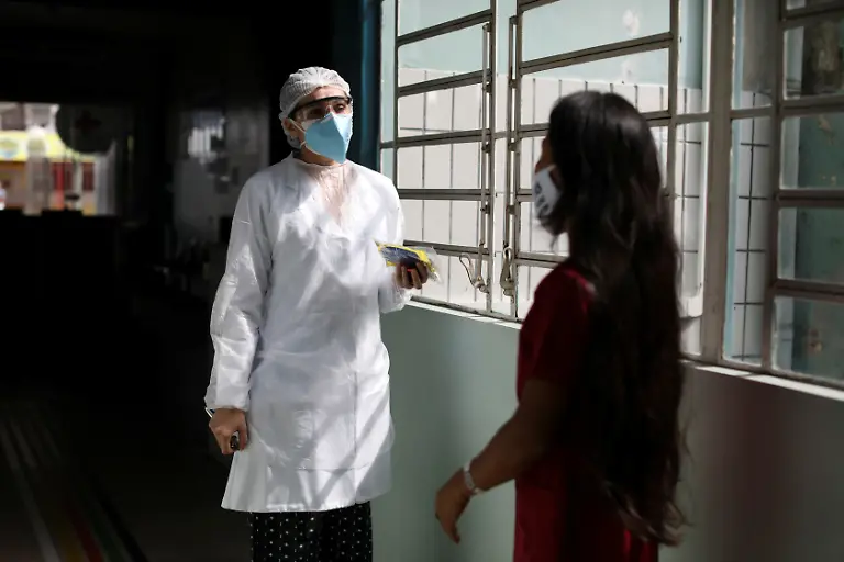 2020-05-07T000000Z-284765805-RC2RJG96UYZN-RTRMADP-3-HEALTH-CORONAVIRUS-BRAZIL-INDIGENOUSNURSE