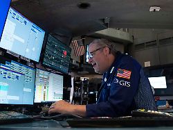 Fed-Gouverneur beruhigt Sorgen: Hoffnungen auf Zinspause beflügeln Wall Street