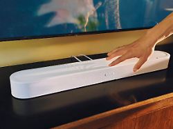 Sonos%20Beam%20Ultra%20with%20hand%20touching%20it%201200x900