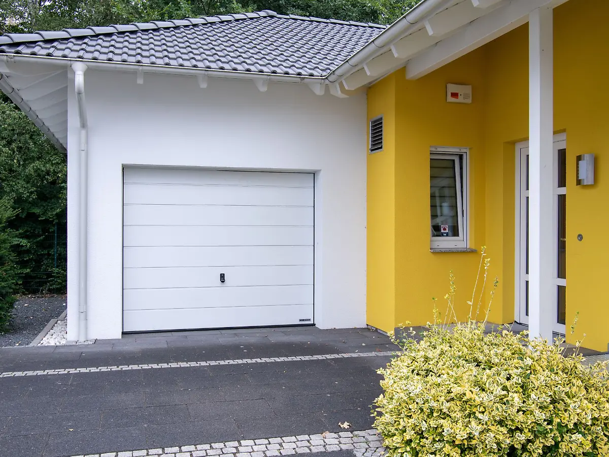 Untätigkeit kostet Ansprüche: Abwehrrecht verwirkt: Nachbar muss zu hohe Garage dulden