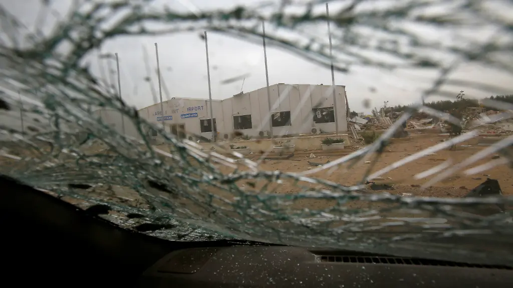 2020-03-13T112752Z-807088841-RC2ZIF96TORA-RTRMADP-3-IRAQ-SECURITY-USA-IRAN-RETALIATION-AIRPORT