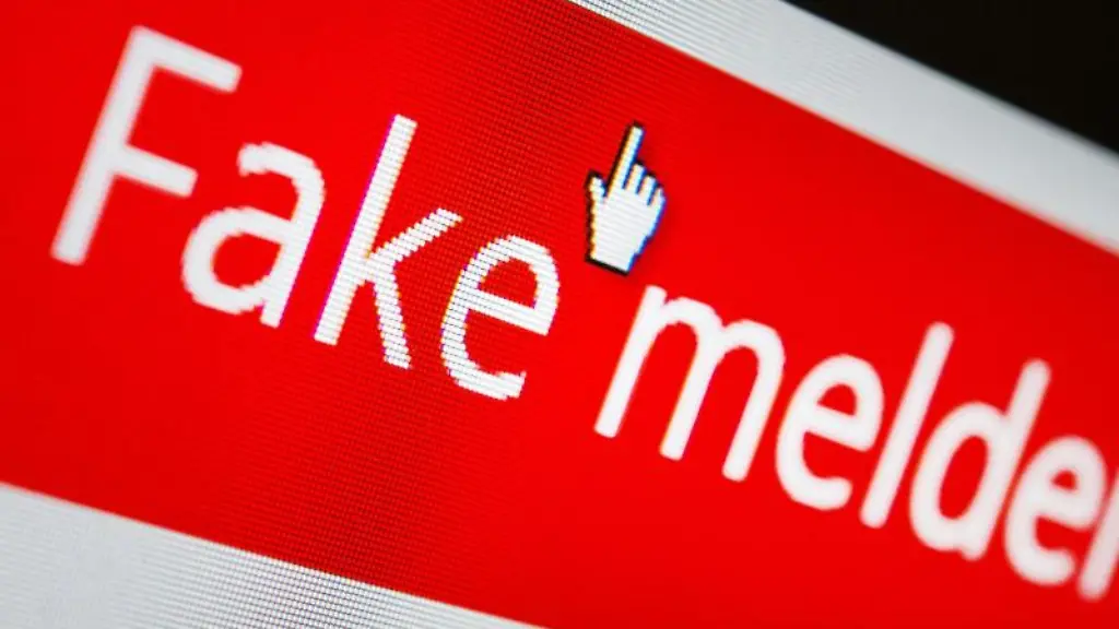 Ein-Mauszeiger-ist-auf-einem-Computermonitor-auf-einem-Button-zu-sehen-mit-dem-man-eine-gefaelschte-Nachricht-melden-kann