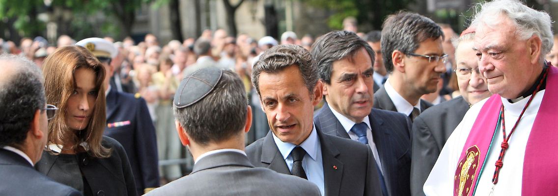 Auch Frankreichs Präsident Sarkozy (m.) nahm an der Trauerfeier teil.