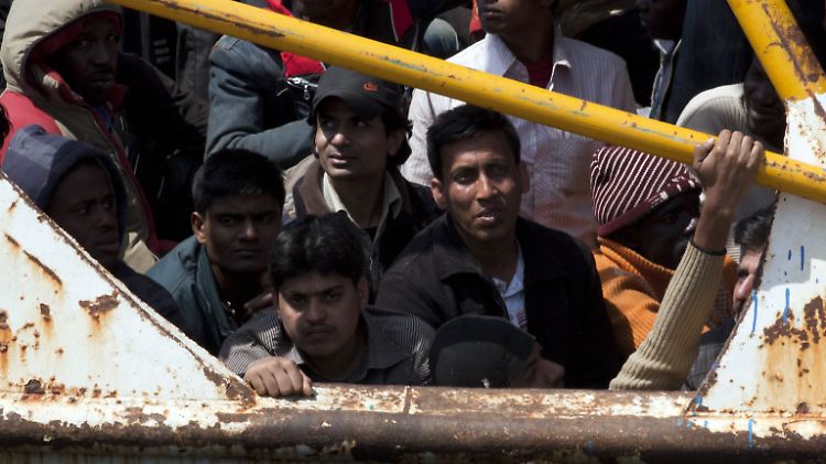 Flüchtlinge aus Libyen bei der Ankunft auf Lampedusa.