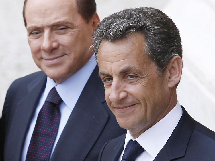 Wollen offene Grenzen schließen: Silvio Berlusconi, links, und Nicolas Sarkozy.