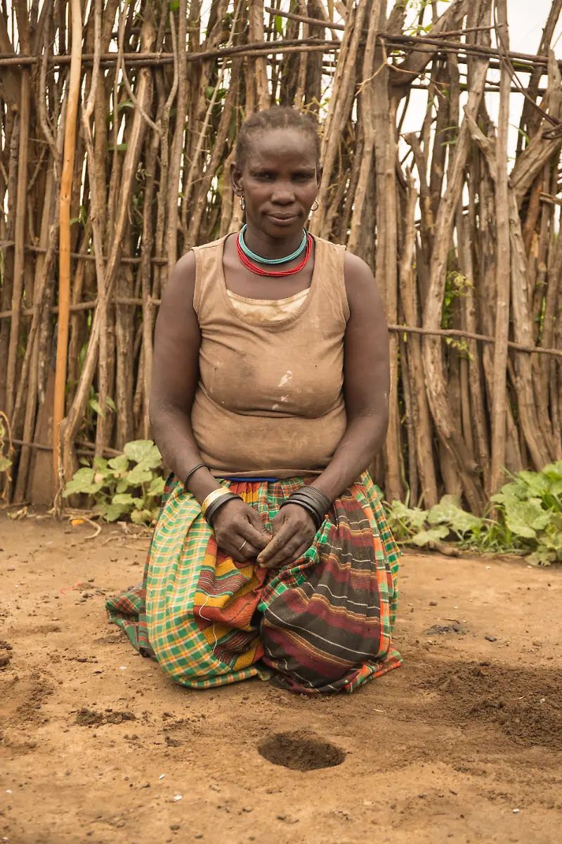 Munyes-44-During-my-period-I-find-it-easy-and-very-normal-to-make-a-hole-in-the-ground-and-sit-on-top-of-it-for-blood-to-drain-in-it-Karamoja-Region-Uganda-September-2018