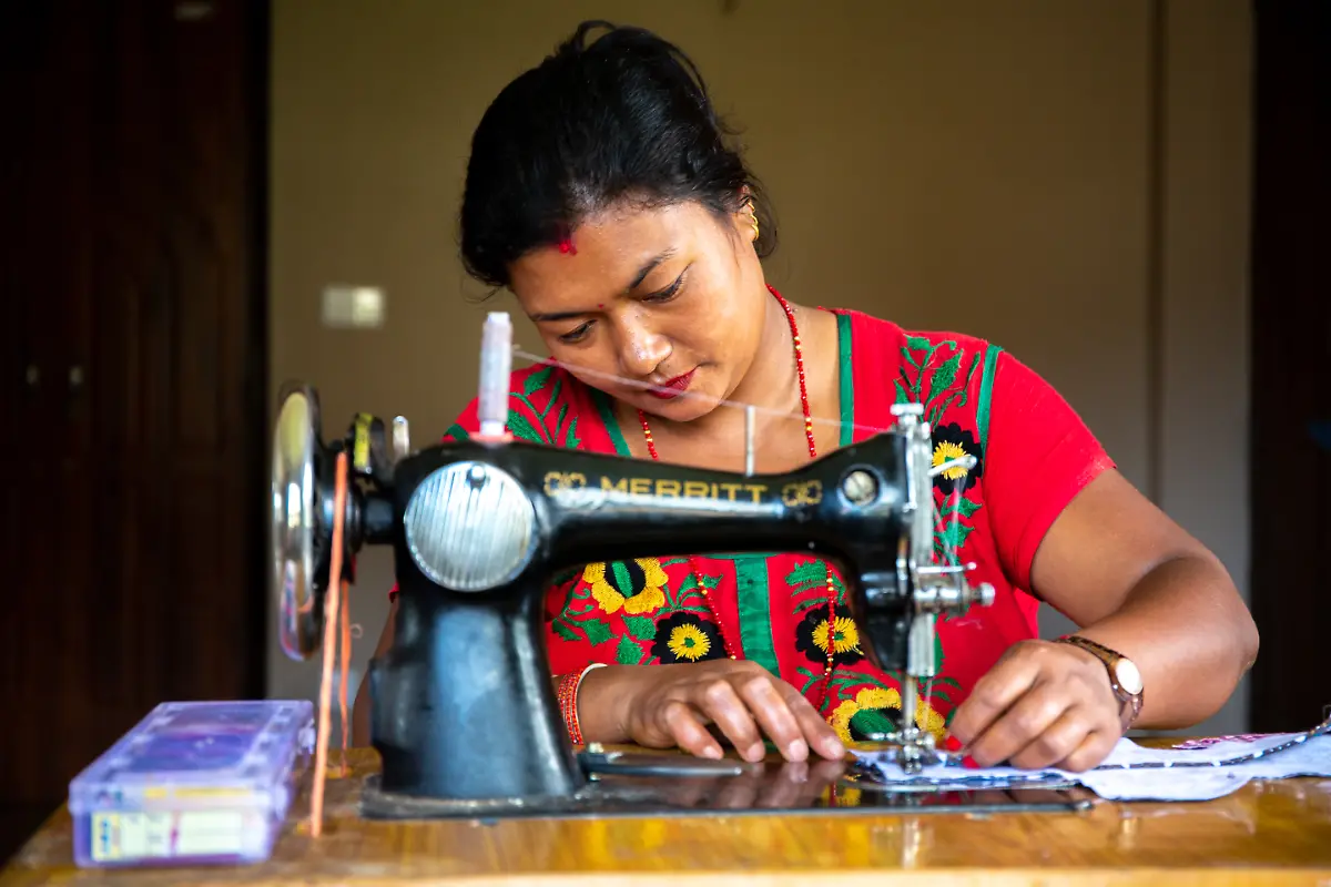 Sangita-32-sewing-the-sanitary-pad-Ready-made-pads-are-costly-and-if-you-do-not-dispose-of-them-properly-it-will-pollute-the-environment-Banepa-Municipality-Kavre-District-Nepal-August-2018