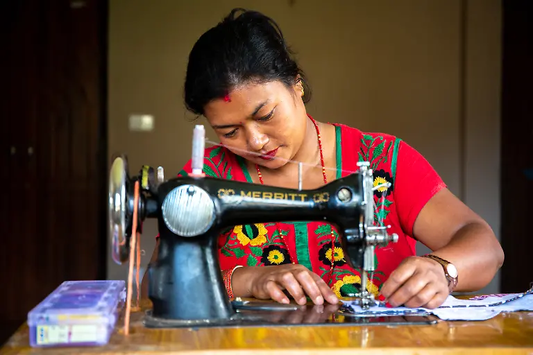 Sangita-32-sewing-the-sanitary-pad-Ready-made-pads-are-costly-and-if-you-do-not-dispose-of-them-properly-it-will-pollute-the-environment-Banepa-Municipality-Kavre-District-Nepal-August-2018