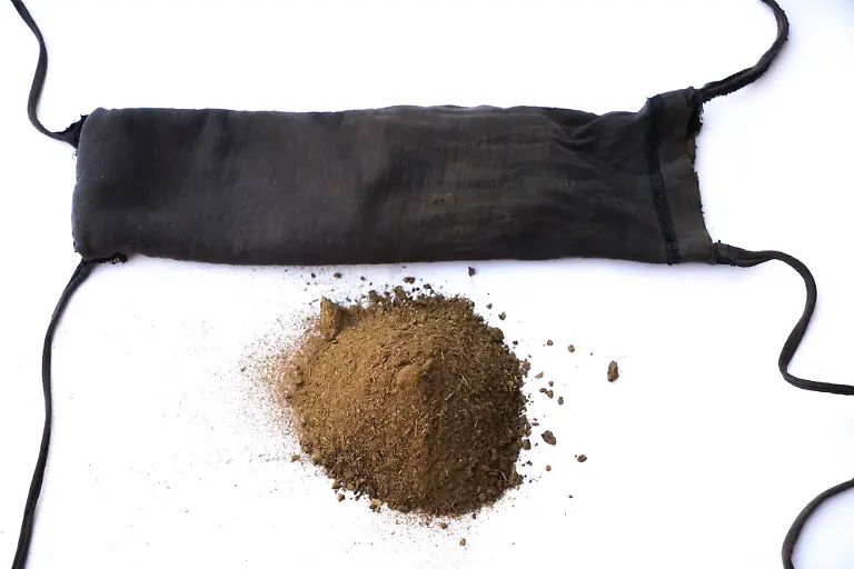 Nowana-45-uses-powdered-cow-patties-in-a-pouch-used-during-menstruation-I-would-prefer-pads-to-cow-patties-if-I-had-a-choice-They-are-easy-and-already-made-they-are-disposable-and-don-t-require-a-lengthy-process-like-the-one-I-go-through-when-using-cow-patties-Mongu-District-Zambia-August-2018