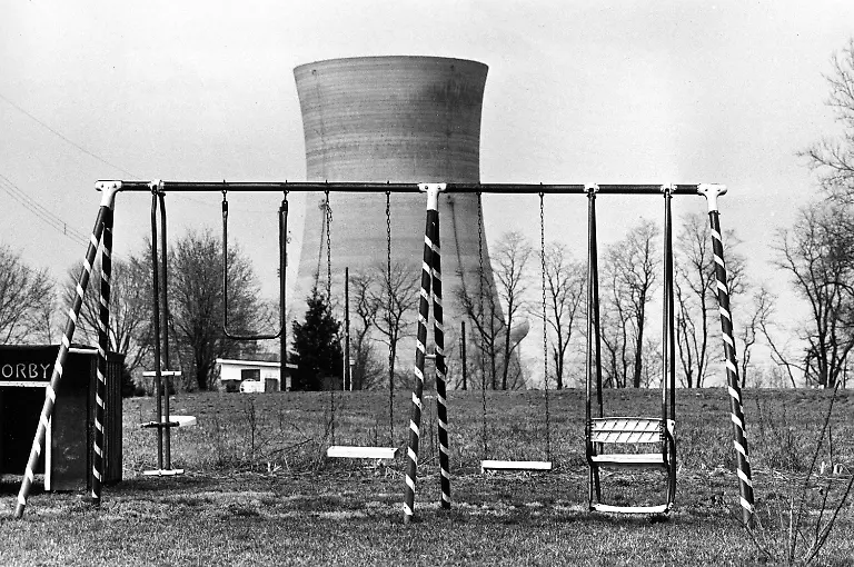 BILD-5-This-March-30-1979-file-photo-shows-a-cooling-tower-of-the-Three-Mile-Island-nuclear-power-plant-near-Harrisburg-Pa-as-it-looms-behind-an-abandoned-playground-Forty-years-after-Three-Mil