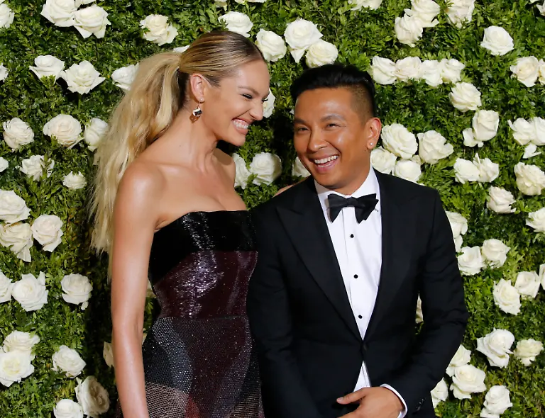 RTS-71st-Tony-Awards-Arrivals-New-York-City-U-S-11062017-Model-Candice-Swanepoel-and-fashion-designer-Prabal-Gurung-REUTERSEduardo-Munoz-Alvarez