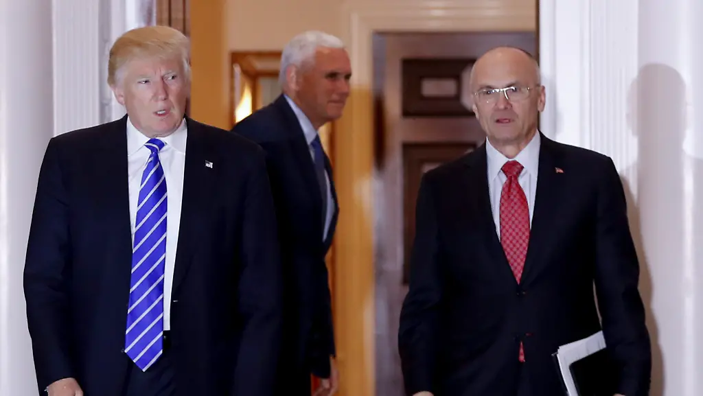 FILE-In-this-Nov-19-2016-file-photo-President-elect-Donald-Trump-walks-Labor-Secretary-designate-Andy-Puzder-from-Trump-National-Golf-Club-Bedminster-clubhouse-in-Bedminster-N-J-Puzder-said-Tuesday-Feb-7-2017-that-a-housekeeper-he-had-previously-employed-at-his-home-was-an-undocumented-worker-potentially-complicating-his-efforts-to-get-confirmed