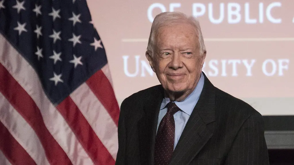 Former-U-S-President-Jimmy-Carter-arrives-to-speak-during-an-event-honoring-former-U-S-Vice-President-Walter-Mondale-hosted-by-the-Humphrey-School-of-Public-Affairs-at-the-University-of-Minnesota-in-Washington-in-this-October-20-2015-file-photo-Carter-delivered-an-unexpected-message-December-6-2015-to-hundreds-of-people-gathered-at-a-Baptist-church-in-Georgia-for-his-bible-lesson-his-latest-brain-scan-showed-no-sign-of-cancer
