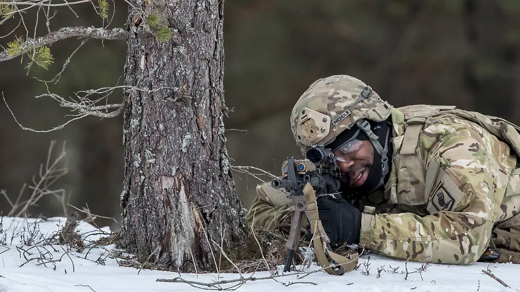 A-member-of-the-U-S-Army-173rd-Airborne-Brigade-takes-part-in-a-military-exercise-at-a-training-range-in-Pabrade-north-of-the-capital-Vilnius-Lithuania-on-Thursday-Feb-2-2017