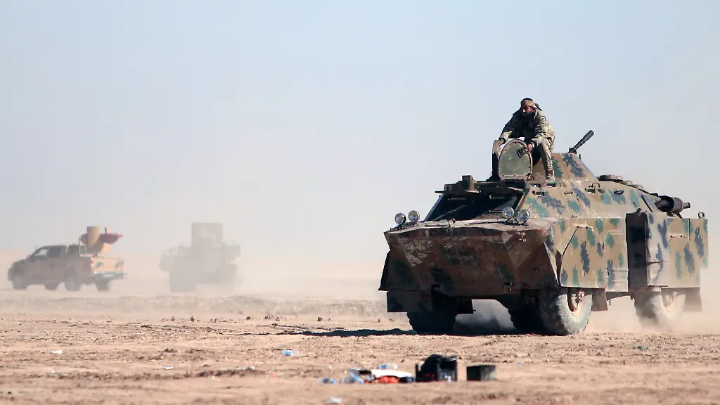 A-Syrian-Democratic-Forces-SDF-fighters-sits-on-a-vehicle-in-the-north-of-Raqqa-city-Syria-February-3-2017-Picture-taken-February-3-2017