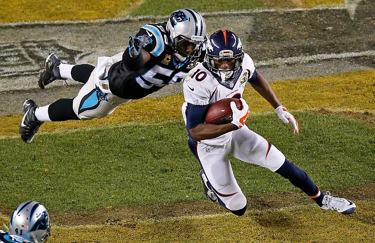 epa05149083-Carolina-Panthers-outside-linebacker-Thomas-Davis-L-tackles-Denver-Broncos-wide-receiver-Emmanuel-Sanders-R-during-the-second-half-of-the-NFL-s-Super-Bowl-50-between-the-AFC-Champion-Denver-Broncos-and-the-NFC-Champion-Carolina-Panthers-at-Levi-s-Stadium-in-Santa-Clara-California-USA-07-February-2016