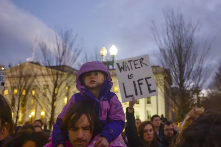 Demonstrators-including-indigenous-leaders-and-climate-activists-protest-after-President-Trump-announced-two-executive-orders-that-will-advance-the-Keystone-XL-and-Dakota-Access-pipelines-The-protest-hosted-by-organizations-including-the-Indigenous-Environmental-Network-350-org-Sierra-Club-and-CREDO-Mobile-took-place-on-the-north-side-of-the-White-House-in-Washington-DC-on-January-24-2017