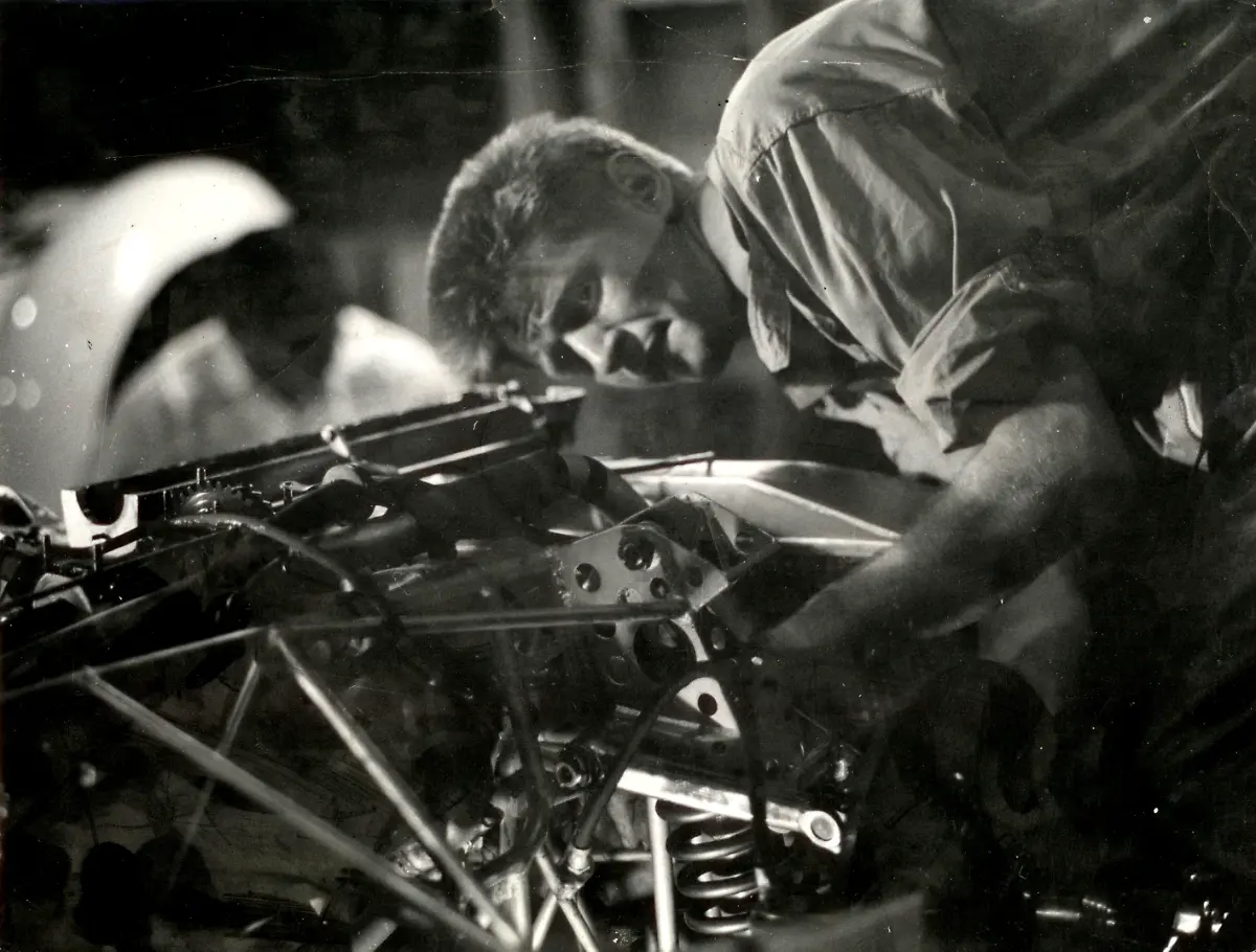 Bob-Wallace-working-on-Maserati-Birdcage-1960s