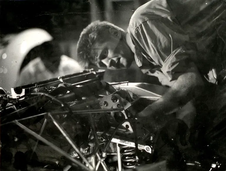 Bob-Wallace-working-on-Maserati-Birdcage-1960s