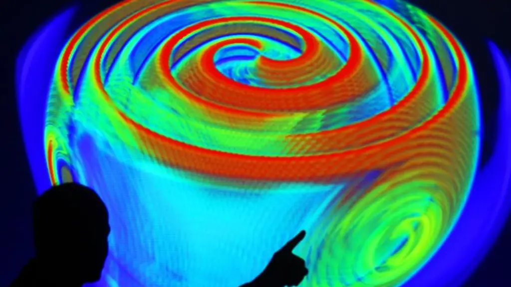 Ein-Mitarbeiter-des-Max-Planck-Instituts-fuer-Gravitationsphysik-in-Potsdam-erlaeutert-anhand-einer-Computersimulation-die-Ausbreitung-von-Gravitationswellen