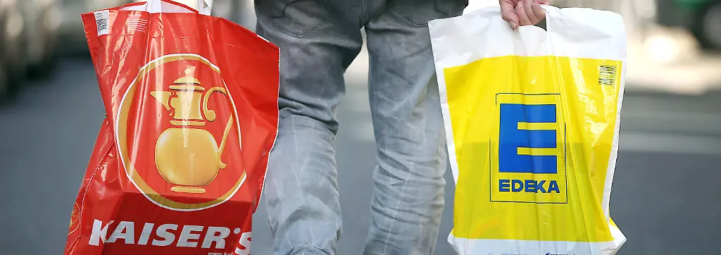 Bild zum Thema Übernahmen und Fusionen