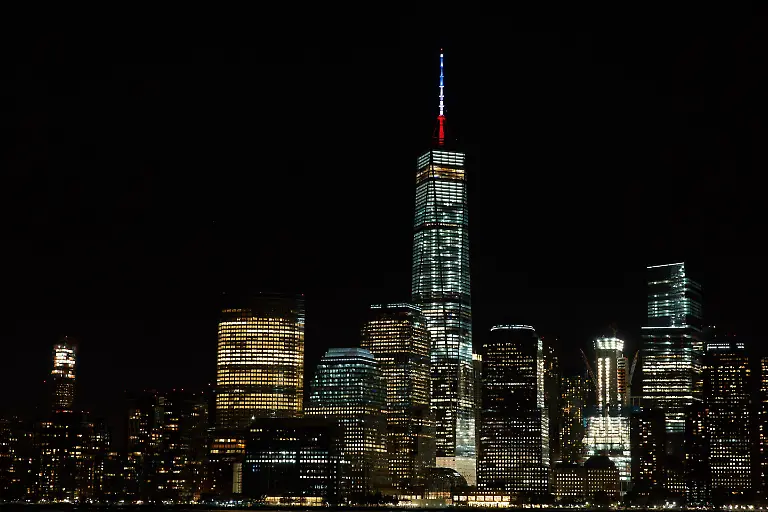 Colors-that-resemble-the-French-national-flag-are-seen-on-top-of-the-tower-of-One-World-Trade-Center-in-New-York
