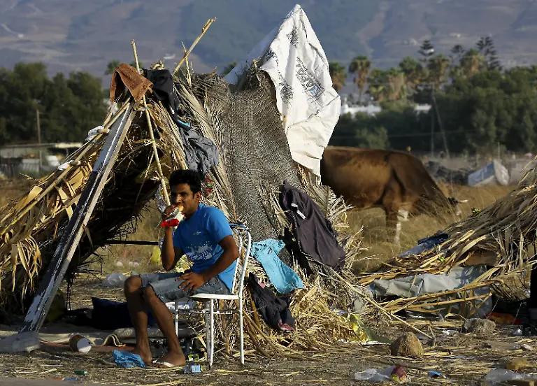 2015-08-08T193952Z-214434580-GF20000017944-RTRMADP-3-EUROPE-MIGRANTS-GREECE-JPG1151736031910581328