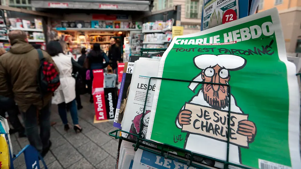 2015-01-14T095000Z-1116971087-GM1EB1E1DBA01-RTRMADP-3-FRANCE-SHOOTING-JPG2797653599025504504