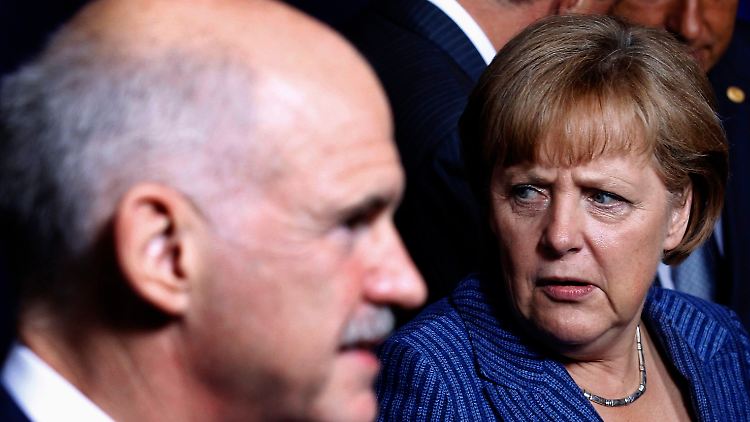 Kanzlerin Merkel und Griechenlands Premier Papandreou stehen heftige Diskussionen bevor.