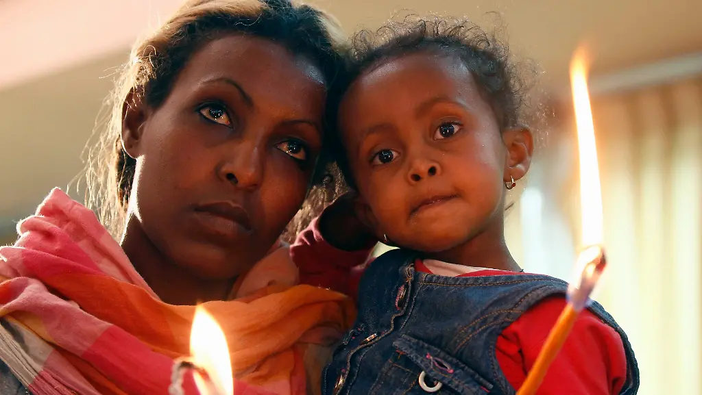 2014-10-03T180546Z-1417712380-GM1EAA405A901-RTRMADP-3-ITALY-IMMIGRATION-JPG6802821073149634312