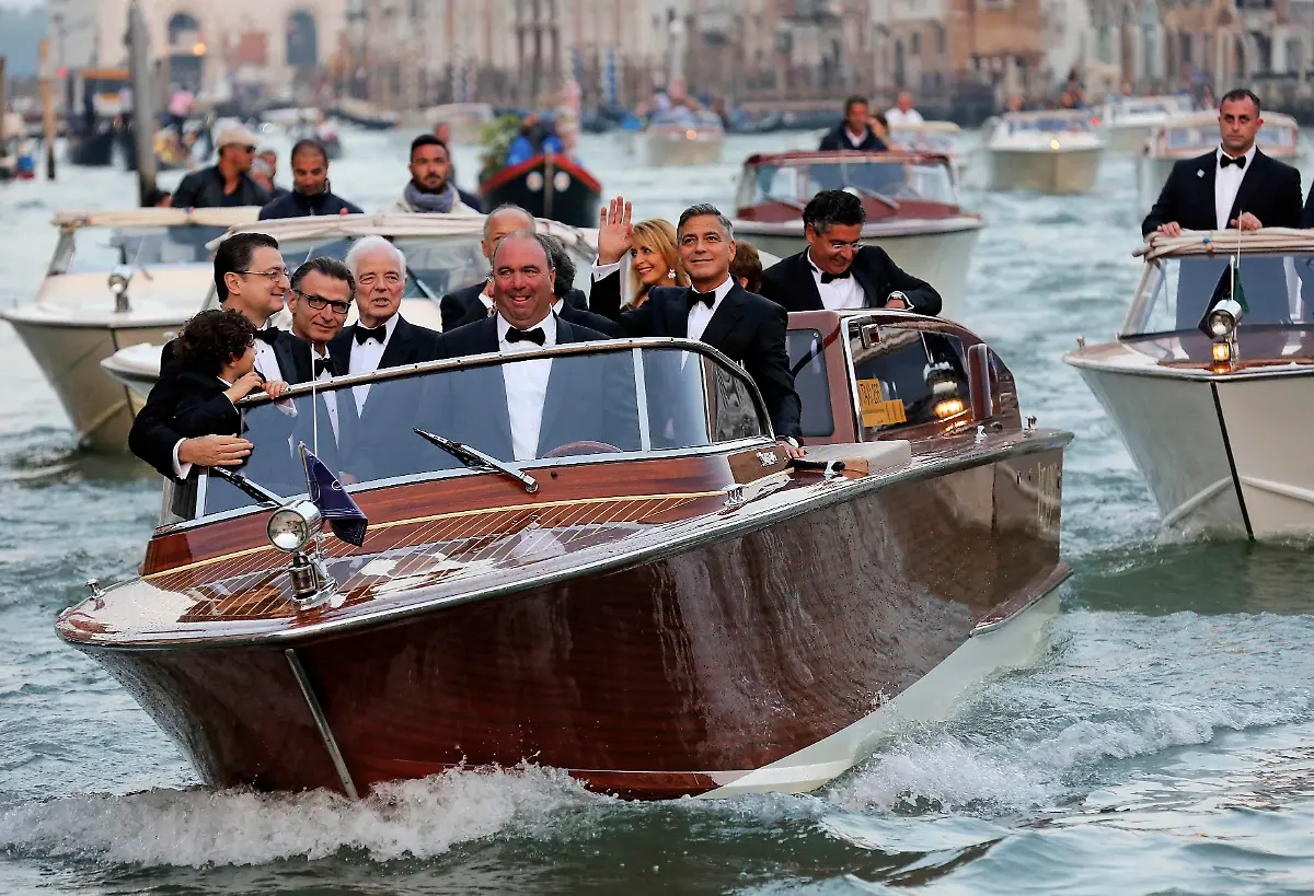 2014-09-27T174914Z-1607279891-GM1EA9S04XS02-RTRMADP-3-PEOPLE-CLOONEY-VENICE-JPG7934717740750811352