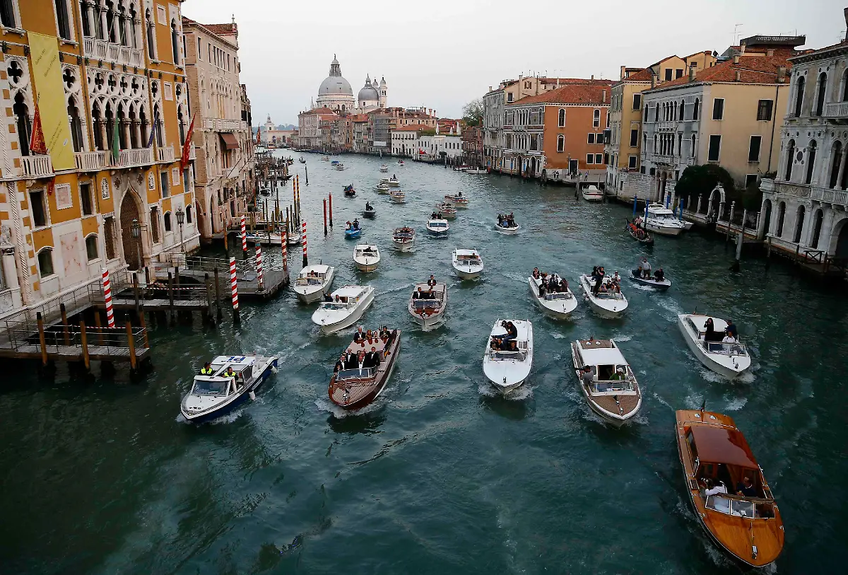 2014-09-27T182005Z-1669109298-GM1EA9S06EE01-RTRMADP-3-PEOPLE-CLOONEY-VENICE-JPG2880449005563475318