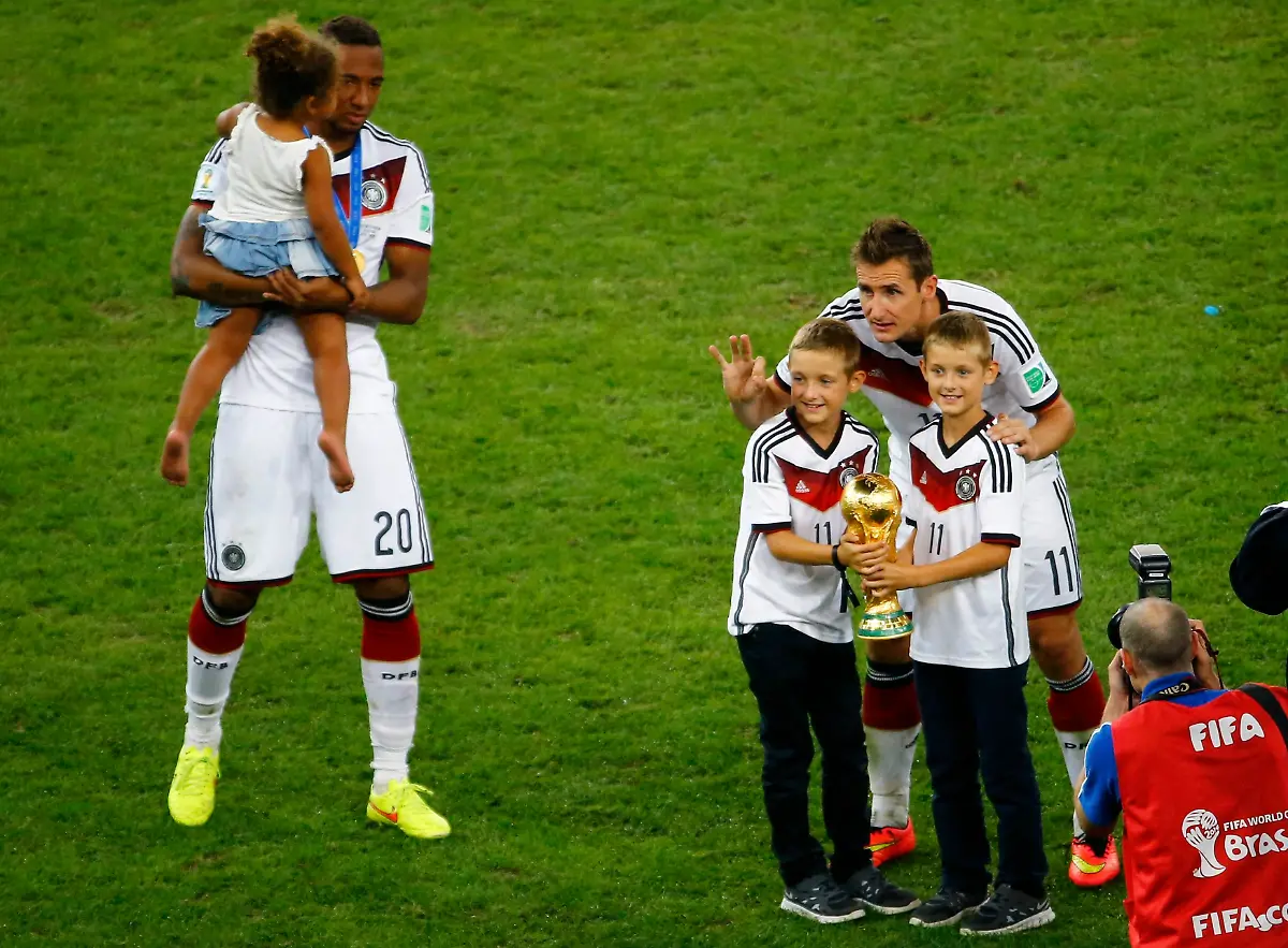 2014-07-13T224150Z-1283522177-TB3EA7D1R59PO-RTRMADP-3-SOCCER-WORLD-M64-GER-ARG-JPG8385210631190435087