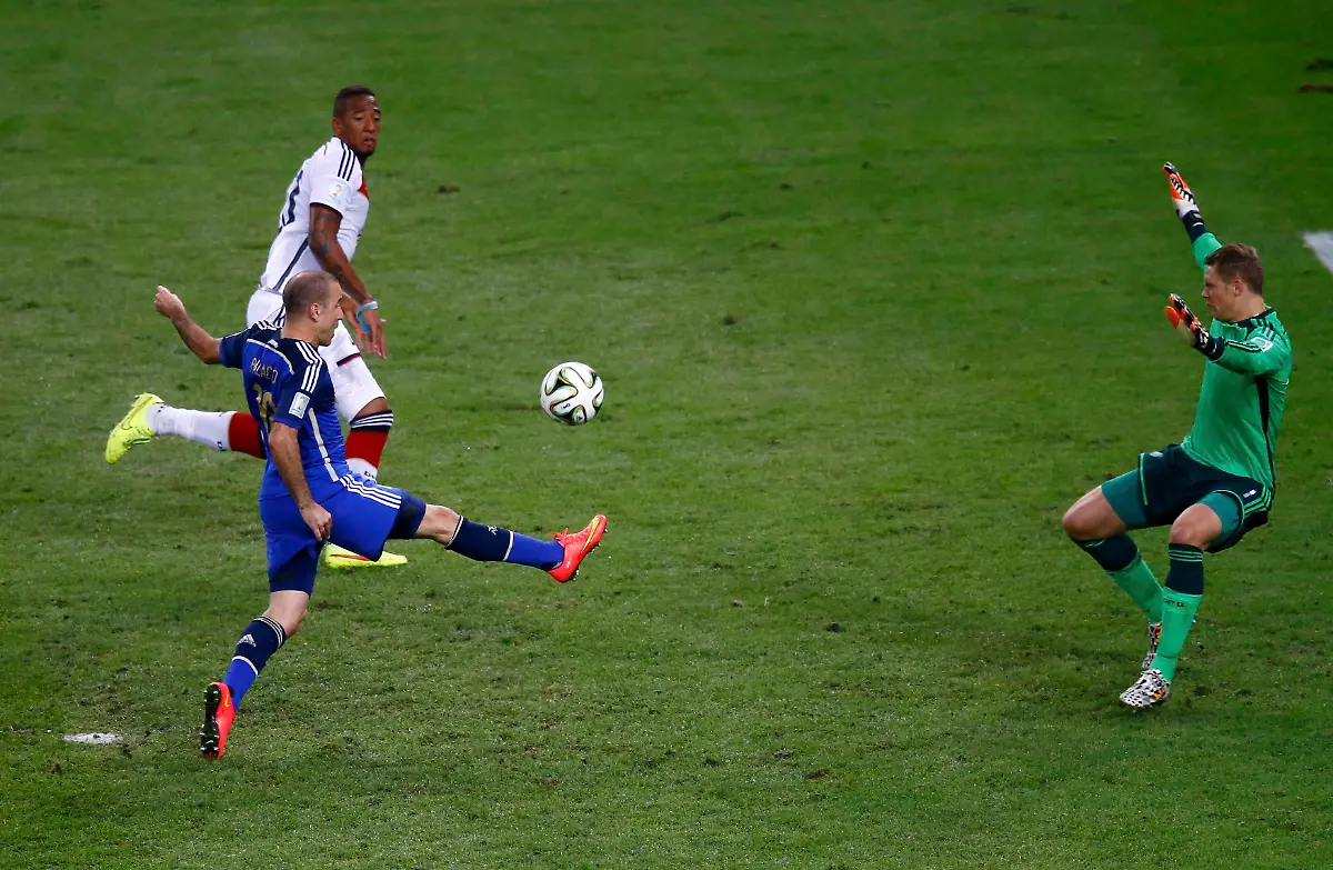 2014-07-13T211005Z-1188461387-TB3EA7D1PFWV0-RTRMADP-3-SOCCER-WORLD-M64-GER-ARG-JPG8101472528940867544