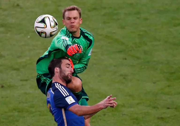 2014-07-13T202124Z-6608280-TB3EA7D1N6URC-RTRMADP-3-SOCCER-WORLD-M64-GER-ARG-JPG7280213890714907806