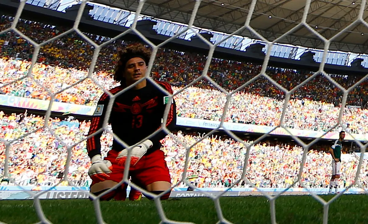 2014-06-29T184453Z-1870066132-TB3EA6T1IQDGE-RTRMADP-3-SOCCER-WORLD-M51-NED-MEX-JPG3272289296523336244