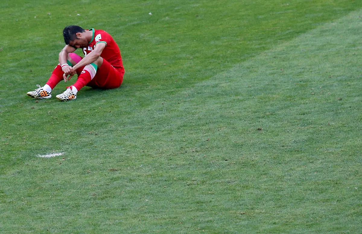 2014-06-21T180958Z-1488465159-TB3EA6L1H3G5K-RTRMADP-3-SOCCER-WORLD-M27-ARG-IRN-JPG5864326827391054496