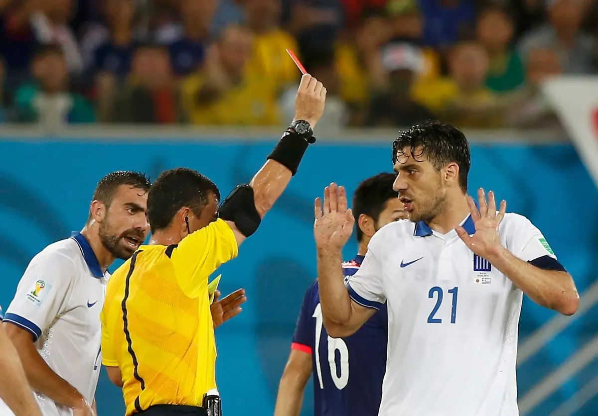 2014-06-20T002113Z-1104566324-GF2EA6K00FZ01-RTRMADP-3-SOCCER-WORLD-M22-JPN-GRE-JPG5856129802868770043